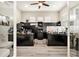 Spacious home office with built-in desks, shelving, and ample natural light at 2608 Calvano Dr, Land O Lakes, FL 34639