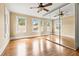Bedroom featuring a large mirror, ceiling fan and natural light from the windows at 2628 2Nd N Ave, St Petersburg, FL 33713