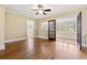 Bright living room featuring hardwood floors and multiple windows for natural light at 2628 2Nd N Ave, St Petersburg, FL 33713