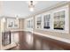 Bright living room with hardwood floors, a fireplace, and large windows at 2628 2Nd N Ave, St Petersburg, FL 33713
