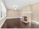 Comfortable living room featuring a fireplace and ample natural light from large windows at 2628 2Nd N Ave, St Petersburg, FL 33713