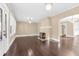 Spacious living room with hardwood floors, a decorative fireplace, and an open layout at 2628 2Nd N Ave, St Petersburg, FL 33713