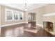 Bright living room with hardwood floors, fireplace, and sun-filled windows at 2628 2Nd N Ave, St Petersburg, FL 33713