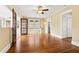 Living room with hardwood floors, ceiling fan, and adjacent rooms at 2628 2Nd N Ave, St Petersburg, FL 33713