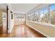 Bright sunroom featuring hardwood floors and multiple windows for natural light at 2628 2Nd N Ave, St Petersburg, FL 33713