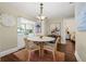 Cozy dining area with round table and chairs, adjacent to the kitchen, perfect for meals at 2710 2Nd N Ave, St Petersburg, FL 33713