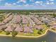 Lakeside community aerial showcasing well-manicured lawns and beautiful home exteriors on a sunny day at 30327 Lettingwell Cir, Wesley Chapel, FL 33543