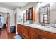 Bathroom with granite countertops and well-lit vanity at 30327 Lettingwell Cir, Wesley Chapel, FL 33543