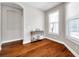 Bright den features hardwood floors and desk at 30327 Lettingwell Cir, Wesley Chapel, FL 33543