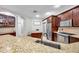 Kitchen featuring granite countertops, stainless appliances, and modern cabinetry at 30327 Lettingwell Cir, Wesley Chapel, FL 33543