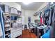 Spacious walk-in closet featuring shelving and ample storage at 30327 Lettingwell Cir, Wesley Chapel, FL 33543