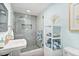 Stylish bathroom featuring a glass-enclosed shower, modern fixtures, and serene decor at 337 Rex Pl # G, Madeira Beach, FL 33708