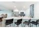 Modern kitchen with white cabinets, stainless steel appliances, and a stylish backsplash at 337 Rex Pl # G, Madeira Beach, FL 33708