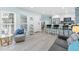 Bright and airy living room flowing into the kitchen and dining area at 337 Rex Pl # G, Madeira Beach, FL 33708