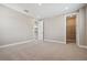 Spacious bedroom with recessed lighting, adjacent closet, and hallway access at 34084 Torrent Ln, Wesley Chapel, FL 33543