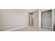 Bedroom with carpeted floors, neutral walls, and walk-in closet at 34084 Torrent Ln, Wesley Chapel, FL 33543