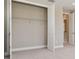 A spacious walk-in closet featuring metal shelving for storage and organization at 34084 Torrent Ln, Wesley Chapel, FL 33543