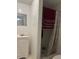 Bathroom with shower and single sink vanity with white cabinets at 3713 E Clifton St, Tampa, FL 33610
