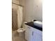 Bathroom with shower and single sink vanity at 3713 E Clifton St, Tampa, FL 33610