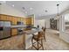 Well-equipped kitchen features stainless steel appliances, ample counter space, and bar seating at 38824 Raiser Rd, Dade City, FL 33525