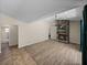 Spacious living room featuring hard surface floors and stone fireplace at 38824 Raiser Rd, Dade City, FL 33525