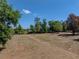 The large, open property offers space for gardens, recreation, or future development, with surrounding trees at 38824 Raiser Rd, Dade City, FL 33525