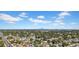 Expansive aerial view of a neighborhood near a city skyline on a partly cloudy day at 4085 37Th N Ave, St Petersburg, FL 33713