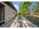 Charming backyard patio featuring an outdoor dining set and mature shade trees at 4085 37Th N Ave, St Petersburg, FL 33713