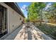 Charming backyard patio featuring an outdoor dining set and mature shade trees at 4085 37Th N Ave, St Petersburg, FL 33713