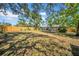 Large fenced backyard provides ample space and privacy, ideal for Gathering activities at 4085 37Th N Ave, St Petersburg, FL 33713