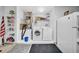 Finished basement with a washer and dryer and ample storage space at 4085 37Th N Ave, St Petersburg, FL 33713