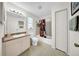 Bright bathroom with a shower-tub combo, single sink vanity, and ample storage at 4085 37Th N Ave, St Petersburg, FL 33713