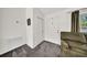Bright entryway with neutral walls, plush carpeting, and white doors at 4085 37Th N Ave, St Petersburg, FL 33713