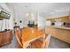 Open floor plan with kitchen, dining table, and living room offering a comfortable and connected living space at 4085 37Th N Ave, St Petersburg, FL 33713