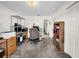 Spacious office with desk, shelving, and storage solutions, ideal for a productive workspace at 4085 37Th N Ave, St Petersburg, FL 33713