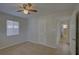 Bedroom with tiled floor, window and access to a bathroom at 4517 2Nd S Ave, St Petersburg, FL 33711