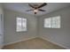 Bright bedroom with two sunny windows and tiled flooring throughout at 4517 2Nd S Ave, St Petersburg, FL 33711