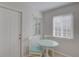 Bright eat-in kitchen featuring white cabinets, granite countertops, and a breakfast nook at 4517 2Nd S Ave, St Petersburg, FL 33711