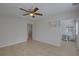 Bright living room features neutral paint, large windows, ceiling fan, and tile floor at 4517 2Nd S Ave, St Petersburg, FL 33711