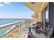 Enjoy waterfront views from the cozy balcony with comfortable seating in this high rise building at 4900 Brittany S Dr # 1810, St Petersburg, FL 33715