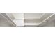 A closet featuring white walls, shelving, and hanging rods at 4900 Brittany S Dr # 1810, St Petersburg, FL 33715