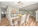 Elegant dining room featuring wood floors, a large table, and decor at 4914 Country Hills Dr, Tampa, FL 33624
