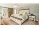 Comfortable main bedroom with a ceiling fan, and ensuite bathroom access at 4914 Country Hills Dr, Tampa, FL 33624