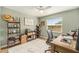 Inviting home office with a large desk, shelves, and window view, perfect for productivity at 4914 Country Hills Dr, Tampa, FL 33624