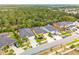 Aerial view of a well-maintained, single-Gathering home with lush green landscaping at 5048 Inshore Landing Dr, Apollo Beach, FL 33572