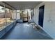 Enjoy this home's enclosed back porch with screen and convenient outdoor access at 5660 86Th Ave, Pinellas Park, FL 33782
