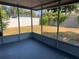 This spacious enclosed porch is perfect for relaxing and enjoying the outdoors at 5660 86Th Ave, Pinellas Park, FL 33782