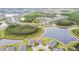 Sprawling community featuring lush green spaces, serene lakes, and well-maintained homes at 5670 Shorebird Br, Land O Lakes, FL 34638