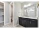 Beautiful bathroom showcasing a vanity with a spacious countertop and ample storage space at 5670 Shorebird Br, Land O Lakes, FL 34638