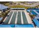 Bocce ball courts are seen in this aerial view, near the clubhouse and tennis courts at 5670 Shorebird Br, Land O Lakes, FL 34638